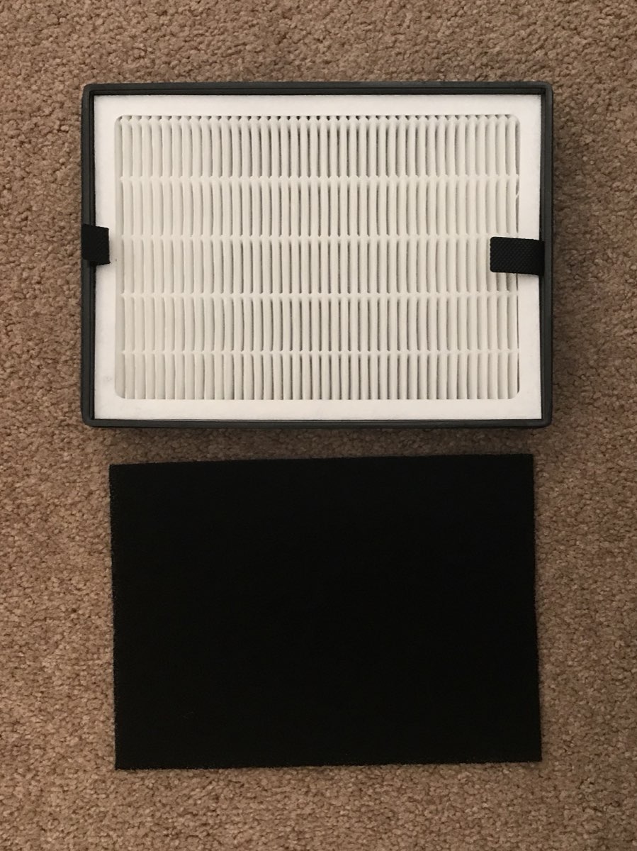 Close-up of a HEPA filter and activated carbon filter from an air purifier